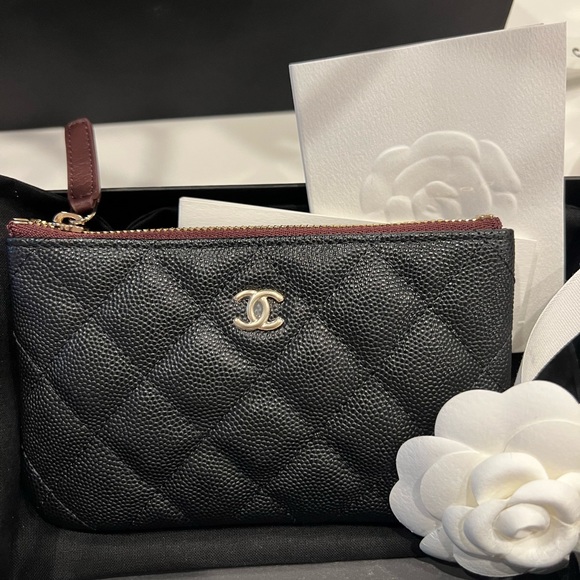 CHANEL Handbags - Chanel classic mini o case in black caviar